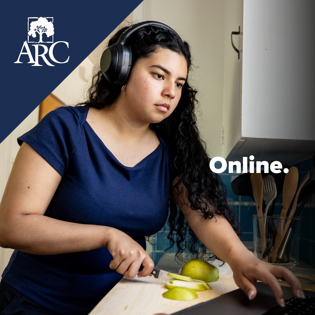 Text over photo of serious woman looking at a laptop computer that says Online next to ARC logo