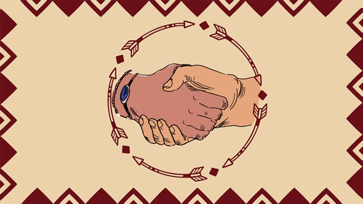 Two shaking hands surrounded by a brown triangle border