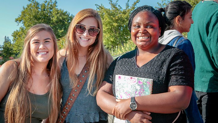 High-quality photo of three CRC students outside